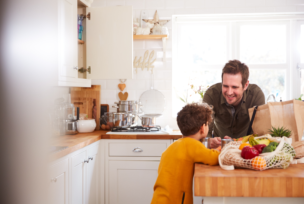 Father and son in kitchen